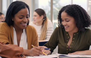 Student smiling with teacher